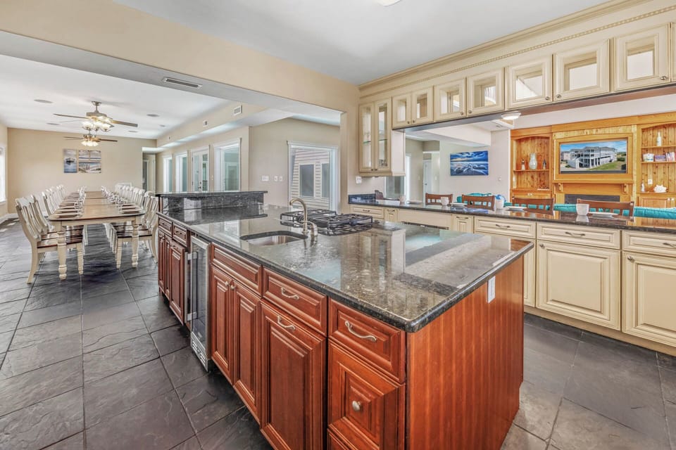 You won't miss a moment of the action thanks to the kitchen's open layout.