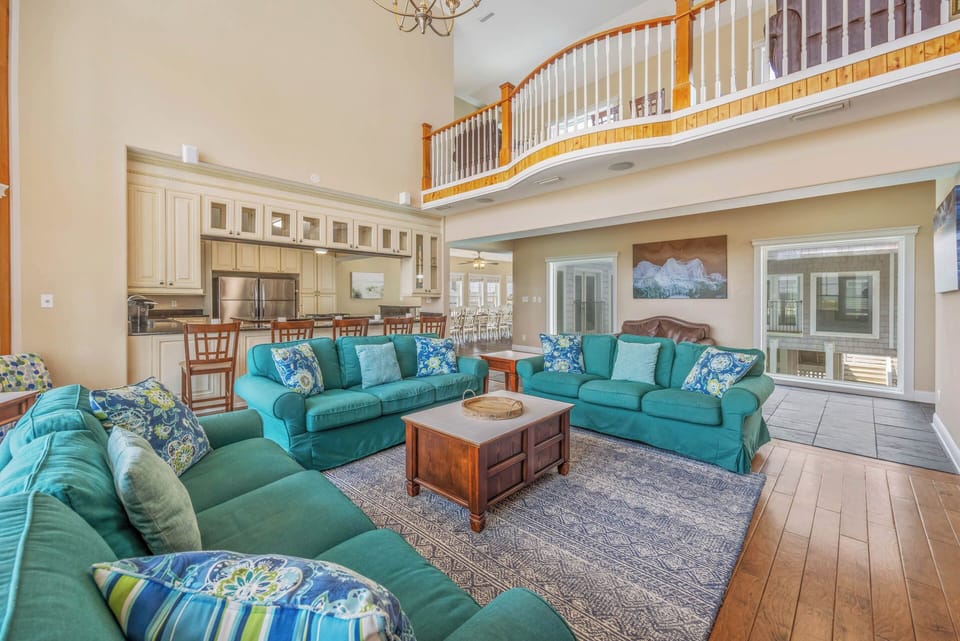 The great room is directly adjacent to the kitchen, dining area, 3 bedrooms, and a half bath.