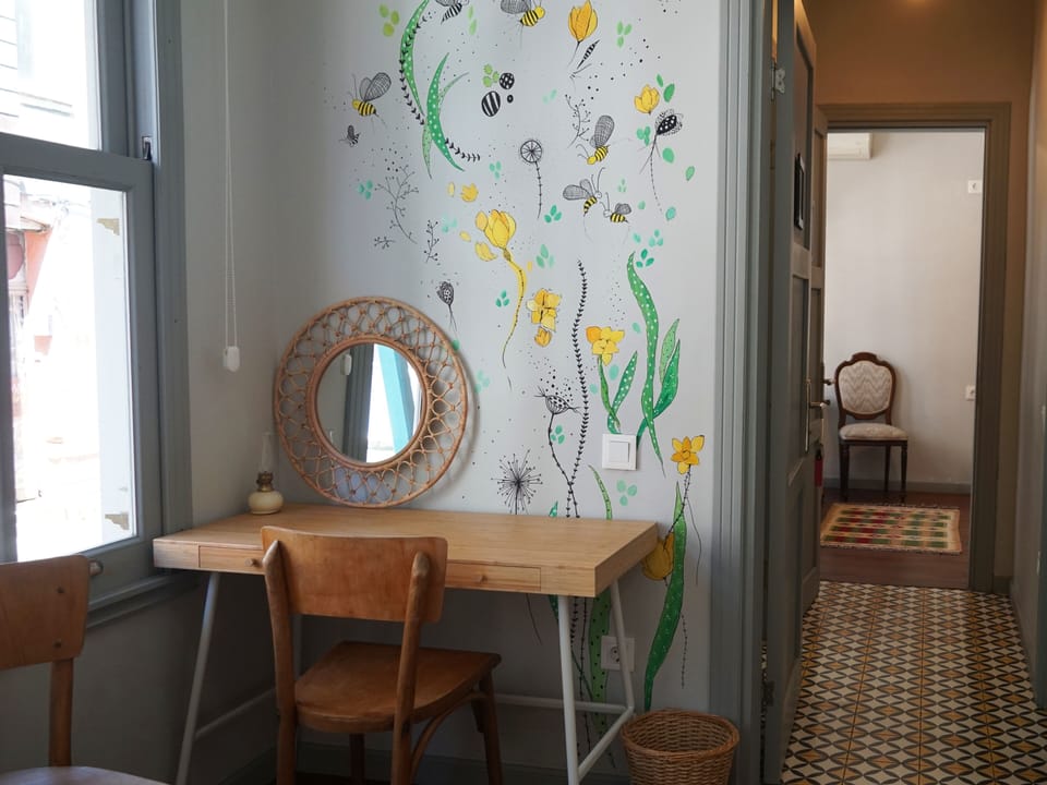 Family Suite, City View | Individually decorated, individually furnished, iron/ironing board