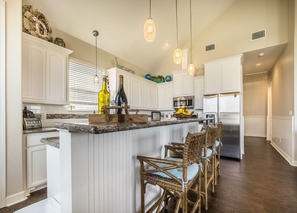 All upgrades in fully stocked kitchen including granite, stainless & misc xtras