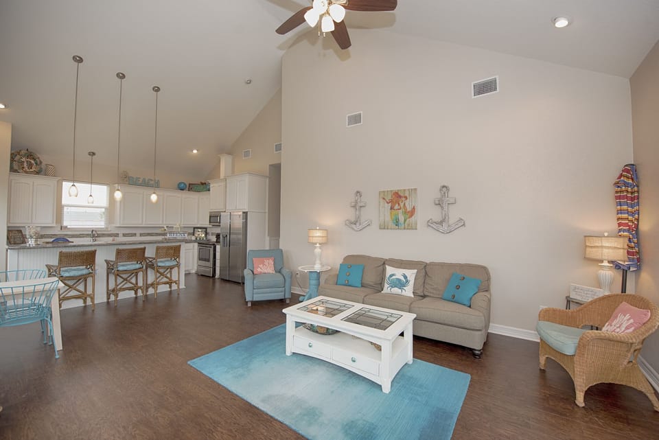 Living & dining boasts open concept with bar seating and plenty of room 