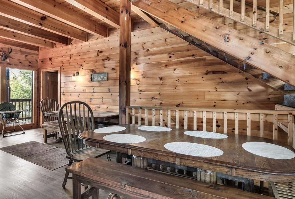 Gather everyone around two large dining tables that make shared meals, prayer, and celebrations feel natural.