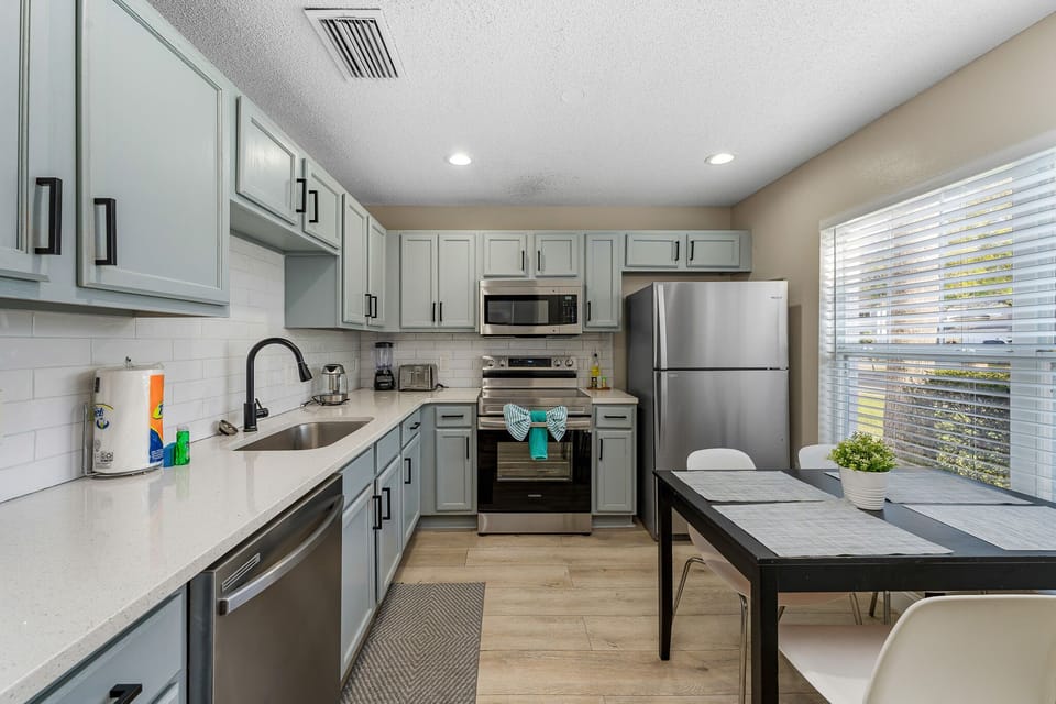 Clean, modern kitchen w/ stainless appliances and plenty of counter space.