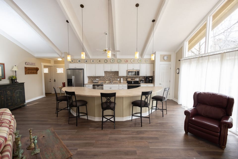 View of spacious entry and kitchen from dining area!