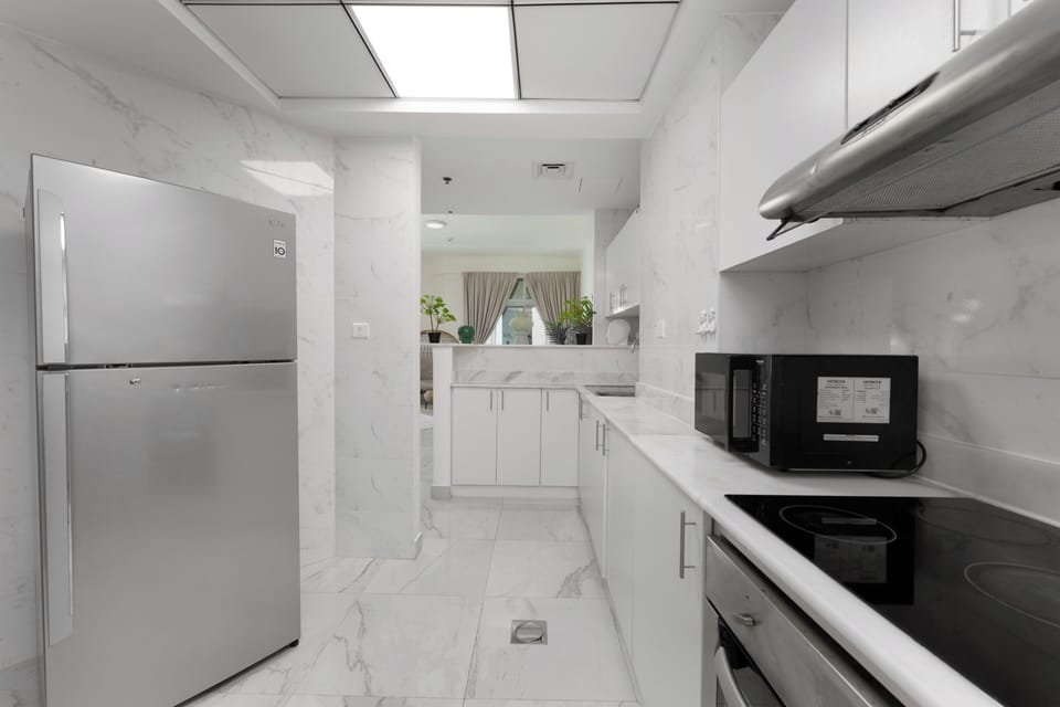 Comfort Apartment | Private kitchen | Fridge, microwave, oven, stovetop