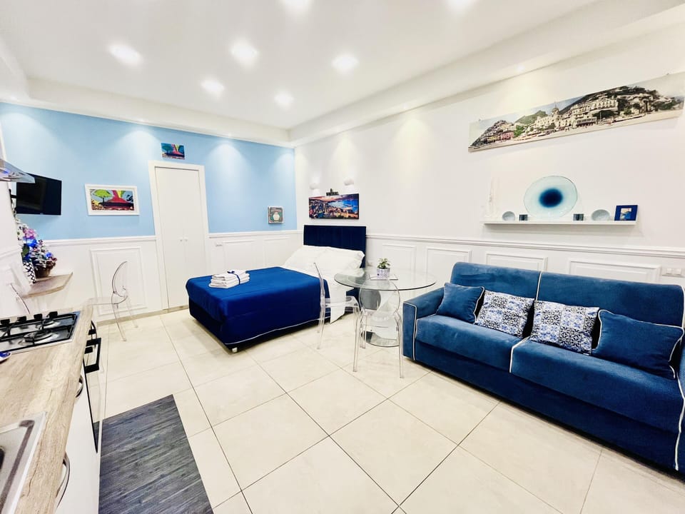 Apartment | Living area | 30-inch TV with digital channels