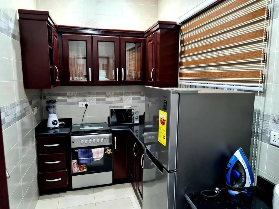 Apartment | Private kitchen | Fridge, microwave, oven, stovetop