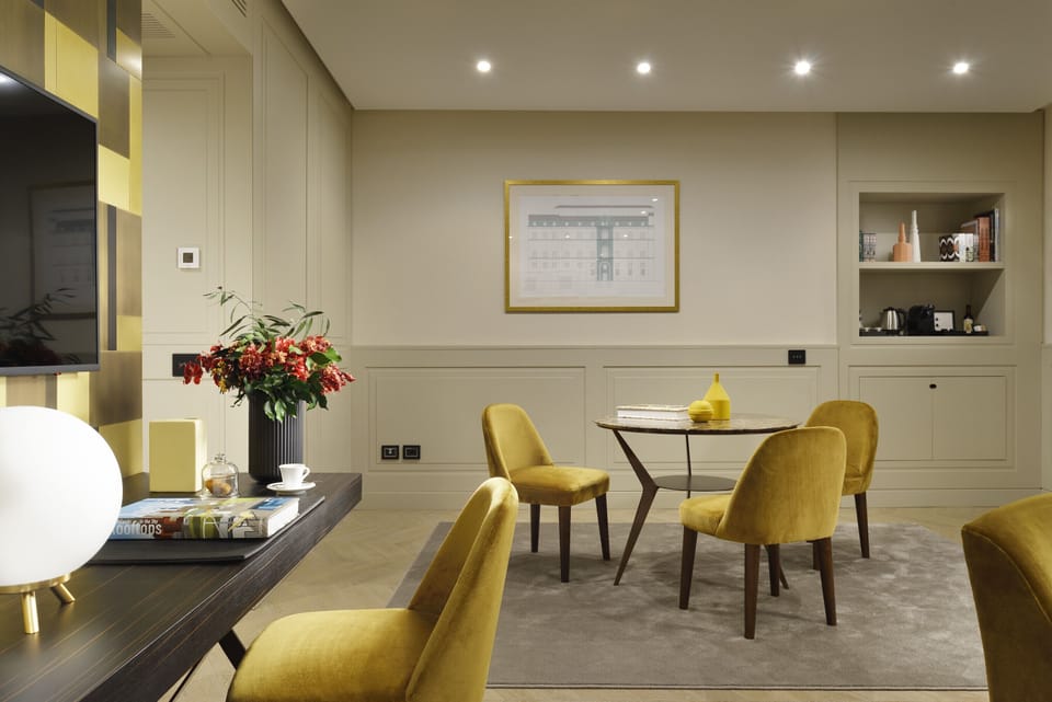 Studio Suite | Living area | 50-inch flat-screen TV with satellite channels, TV