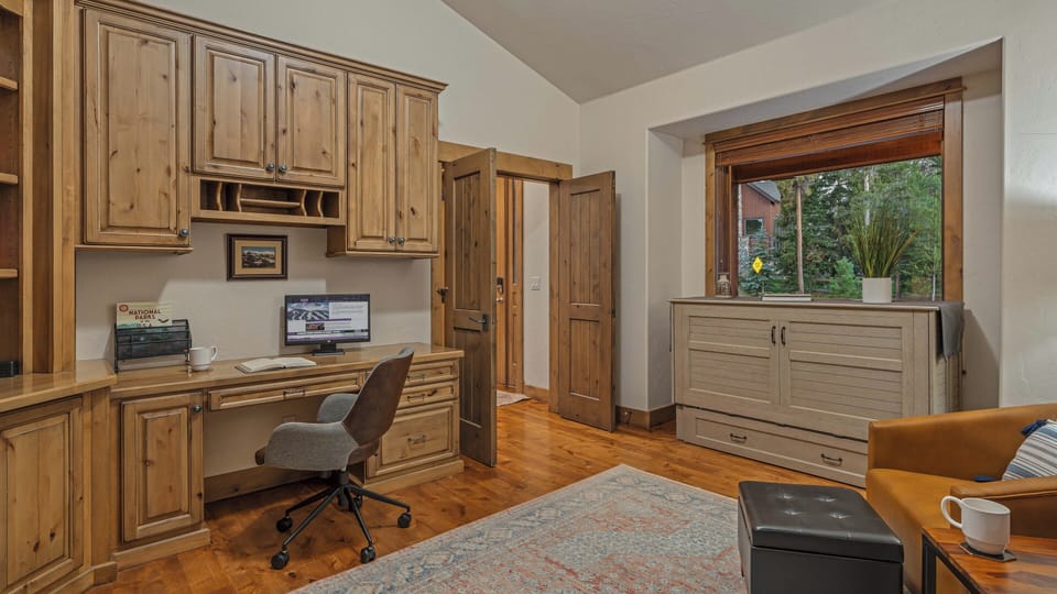 Main level private office with queen sofa bed
