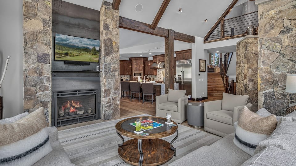 Great Room, Main Level - Open-concept living area with fireplace and kitchen views