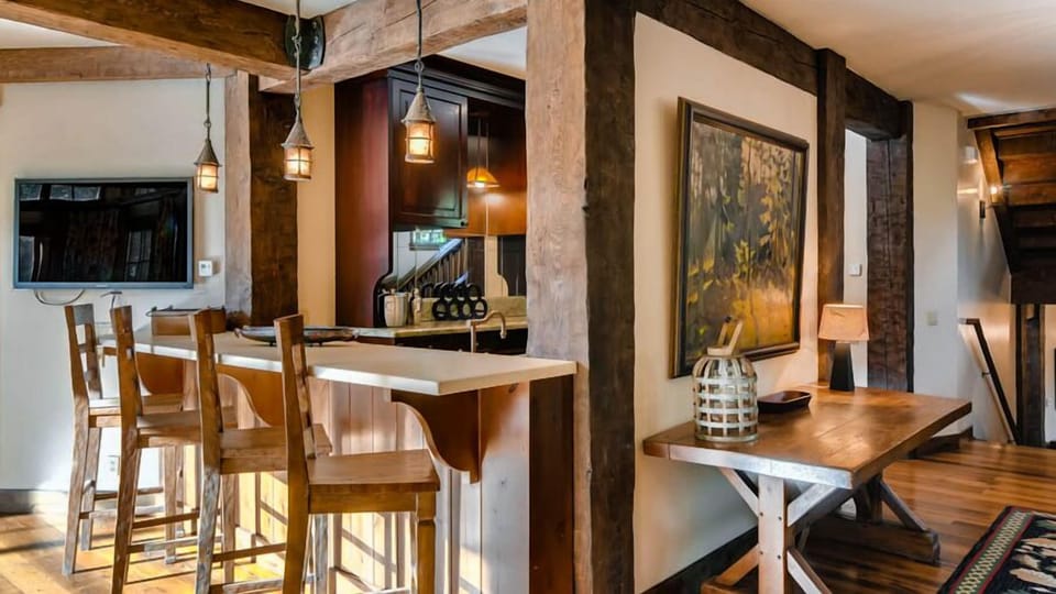 Wet bar on main level with seating for 4