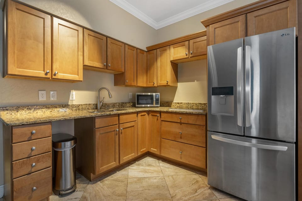 Suite, 1 King Bed, Non Smoking, Balcony | Desk, laptop workspace, blackout drapes, iron/ironing board