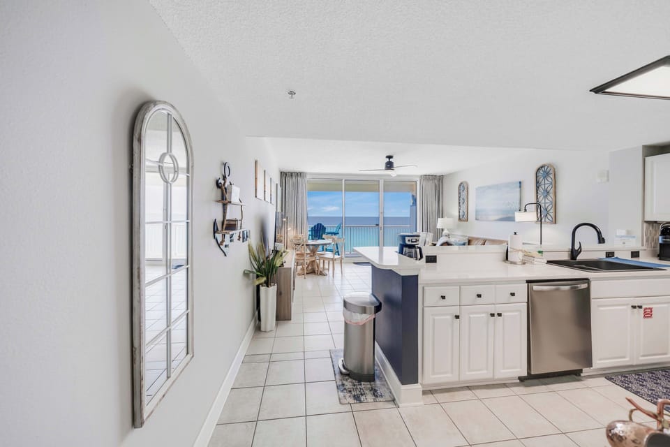 The fully equipped kitchen features quartz countertops, stainless-steel appliances, and has everything you need to prepare meals for family & friends.