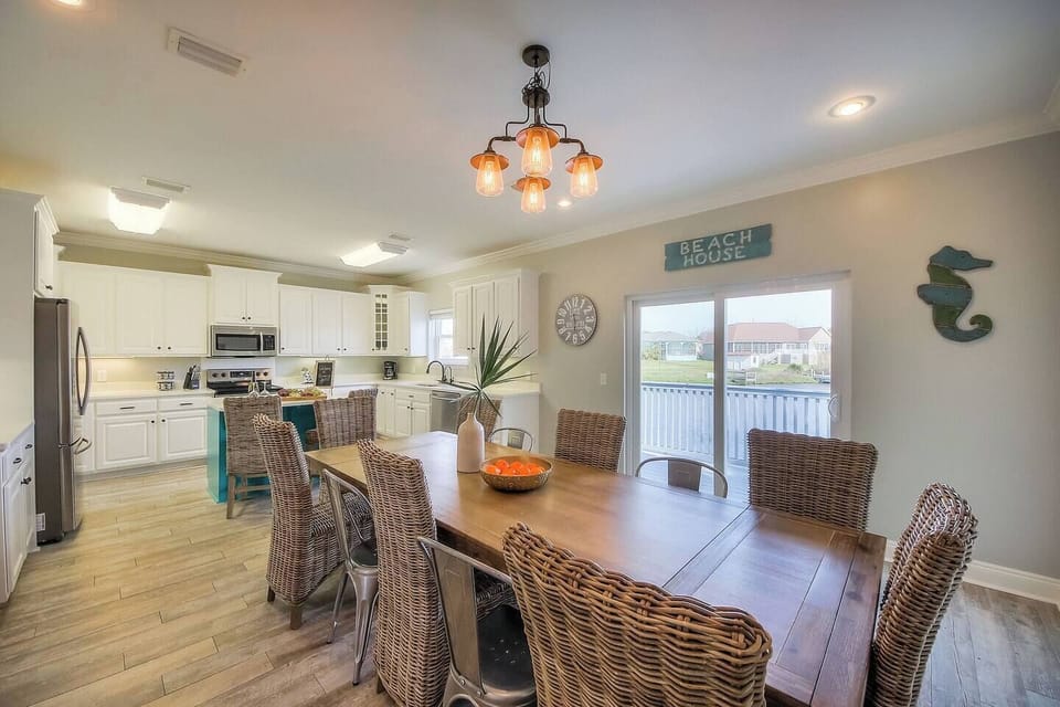 Our newly remodeled kitchen is beautiful, looking out over the lake! There is plenty of room for everyone and all that you would need for cooking a large meal.