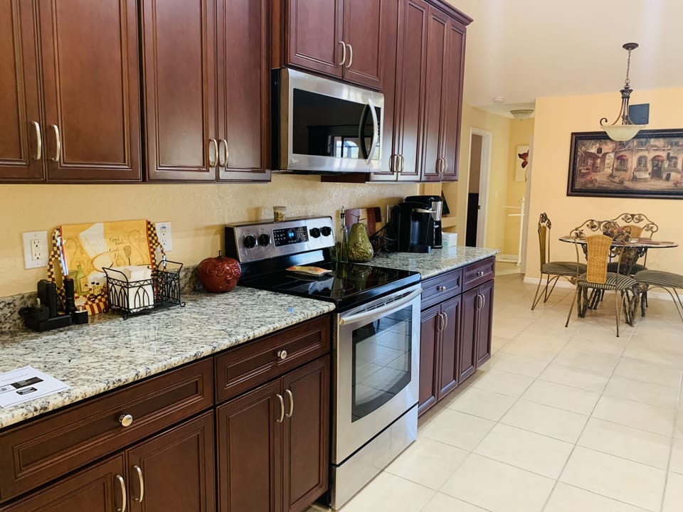 Kitchen with Stainless Steel Appliances and granite countertops