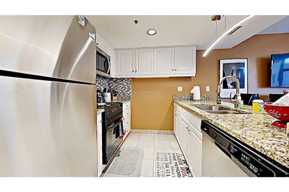 Full Kitchen with stainless steel appliances 