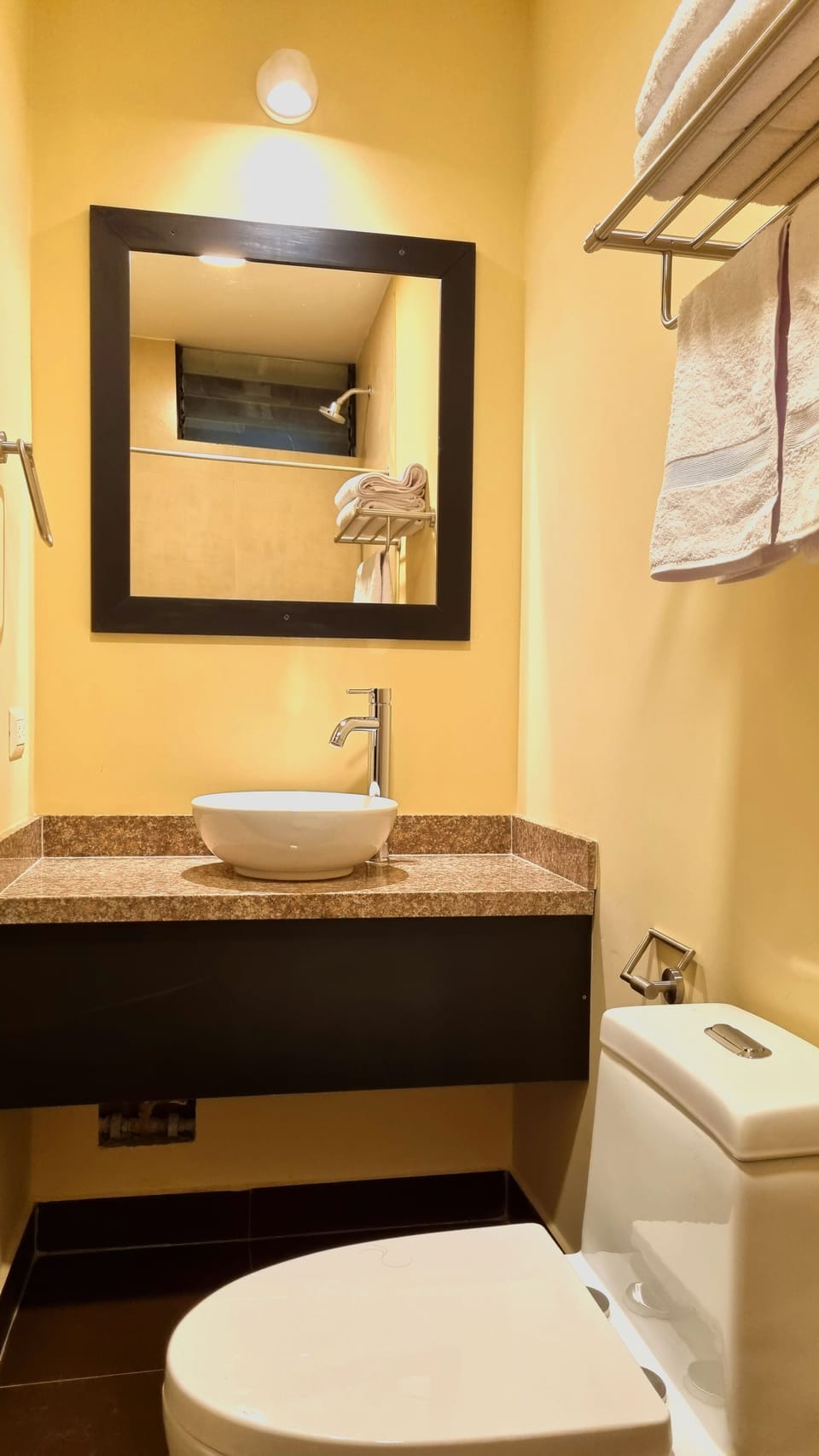 Shower, rainfall showerhead, hair dryer (on request), towels
