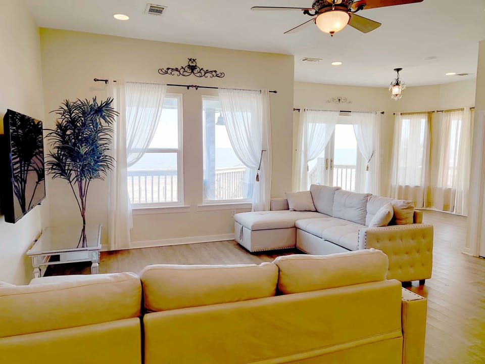 Ocean view from every corner in daytime and 4K TVs for entertainment in evenings