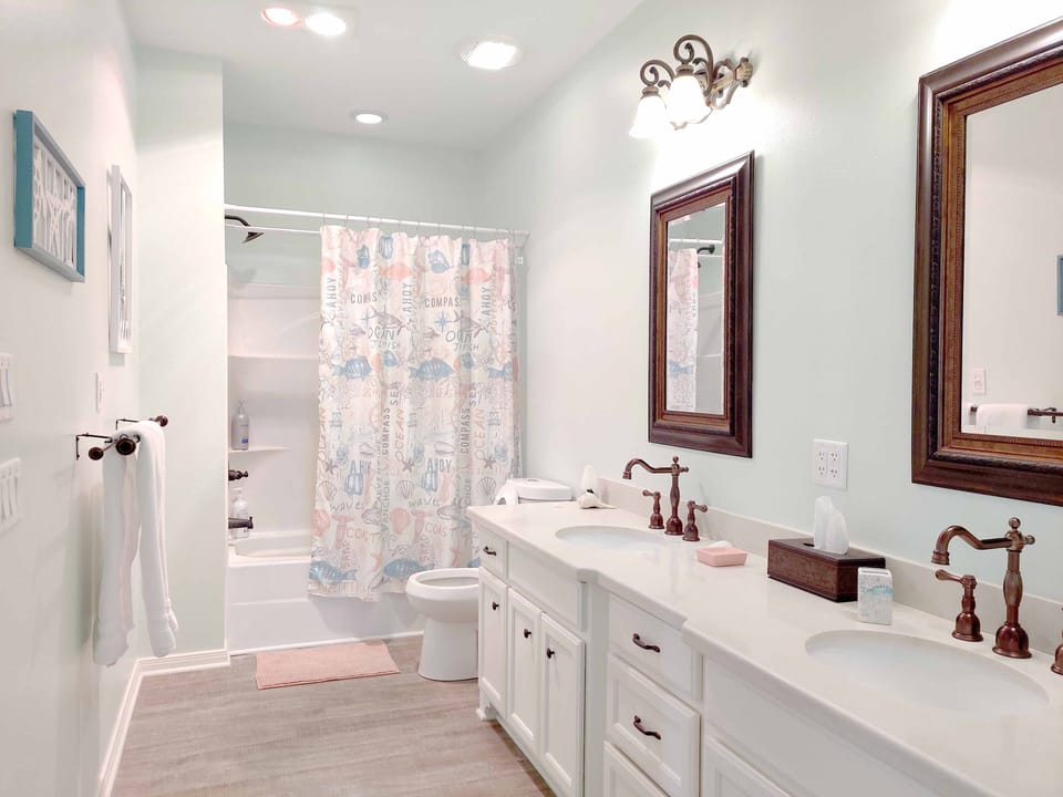 Large luxury master bathroom with heat lamps