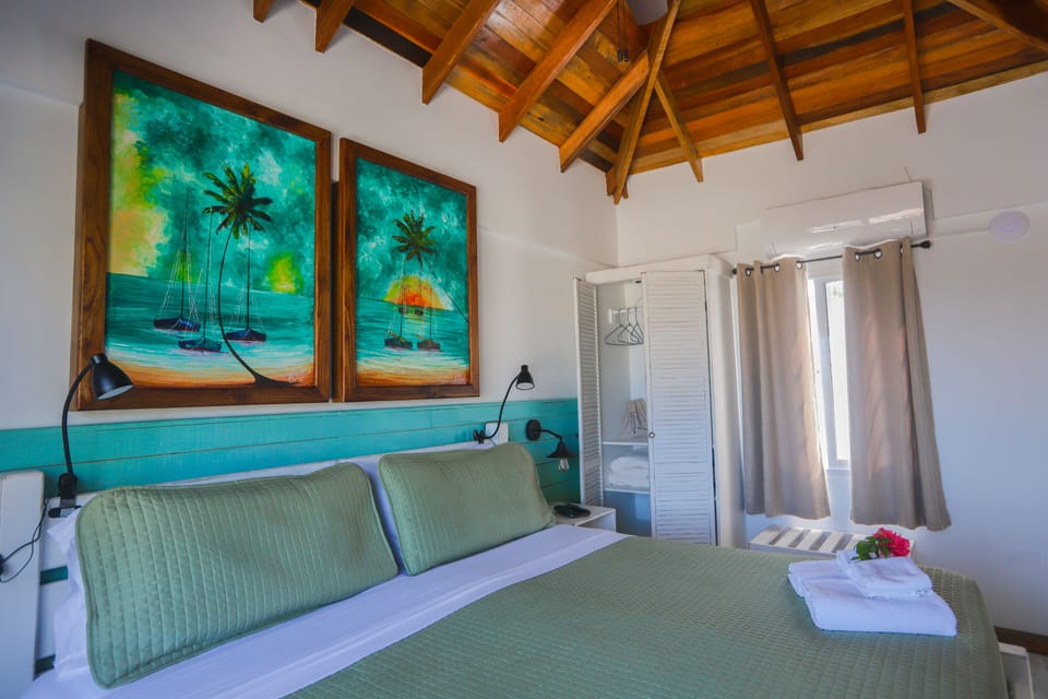 Treetops Suite, Junior Suite, Sea View | Egyptian cotton sheets, premium bedding, memory foam beds, minibar