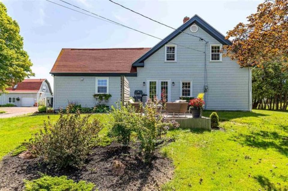 Your side of the house featuring private deck and garden views from each window