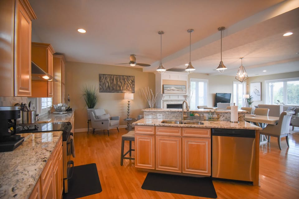 Open floor plan with gourmet kitchen, and plenty of seating