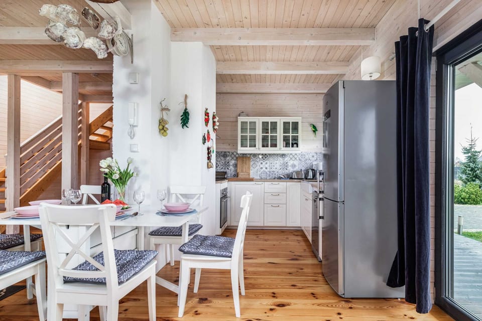 The dining area is coherently connected to the kitchenette.
