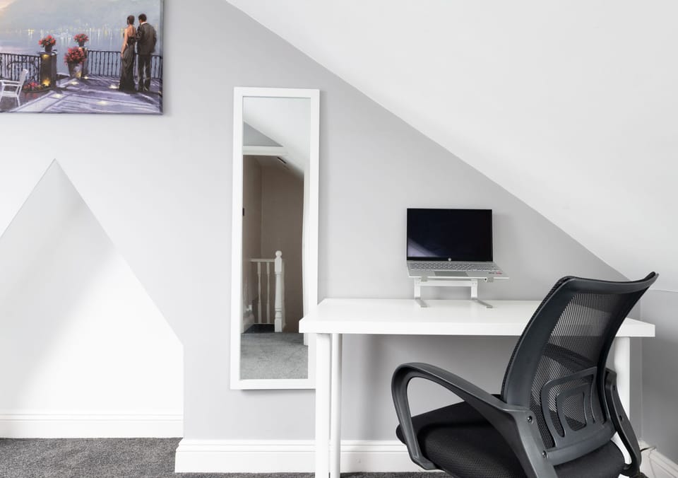 Main bedroom with 'work from home' setup