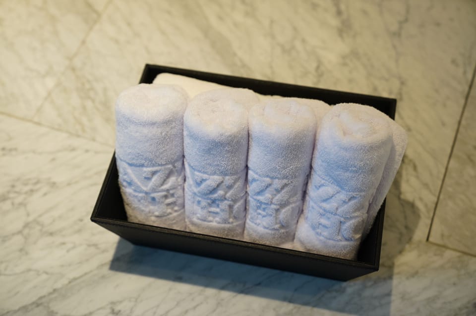 Separate tub and shower, deep soaking tub, designer toiletries