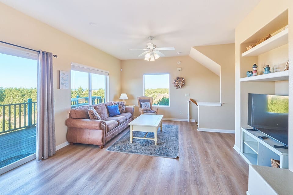 Living Area on 2nd Floor: Your first view as you walk up onto the second floor. Managed By Bloomer Estates.