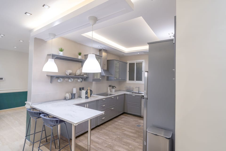 Apartment, 2 Bedrooms | Private kitchen | Fridge, microwave, oven, stovetop