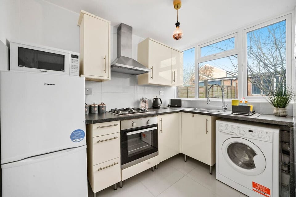 Cook and dine with ease in the fully equipped kitchen, thoughtfully set up with everything you need to prepare and enjoy a home-cooked meal.