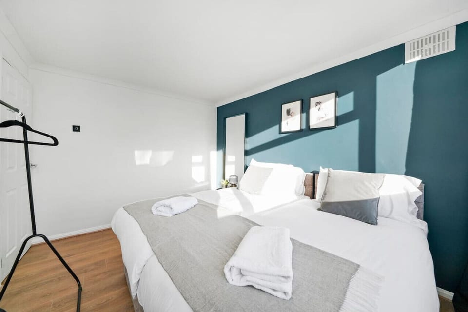 Bedroom 1 features a zip link bed, set up as two single beds by default or can be zipped together as a king-size bed upon request. Fresh linen and towels are provided.