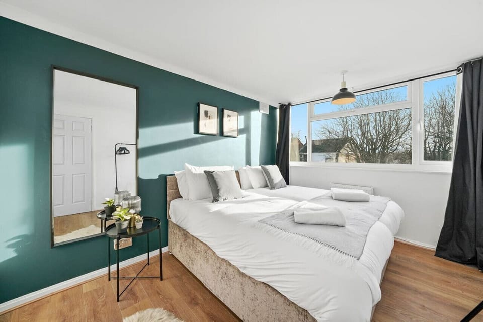 Bedroom 1 features a zip link bed, set up as two single beds by default or can be zipped together as a king-size bed upon request. Fresh linen and towels are provided.