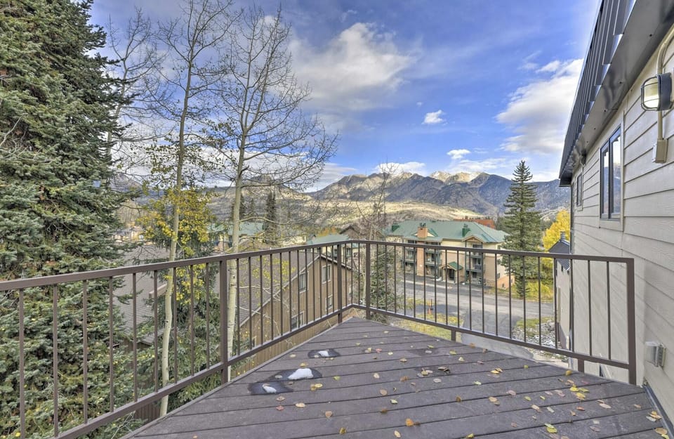 Outdoor patio with lounge furniture and mountain views