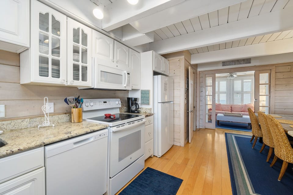 Stocked cabinets, gleaming granite counters...the Chef in the Family will love cooking in this Kitchen!