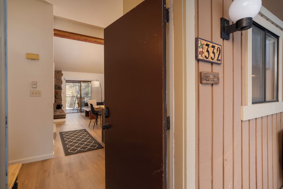 Step through your charming numbered door into a warm, inviting space where comfort awaits you.