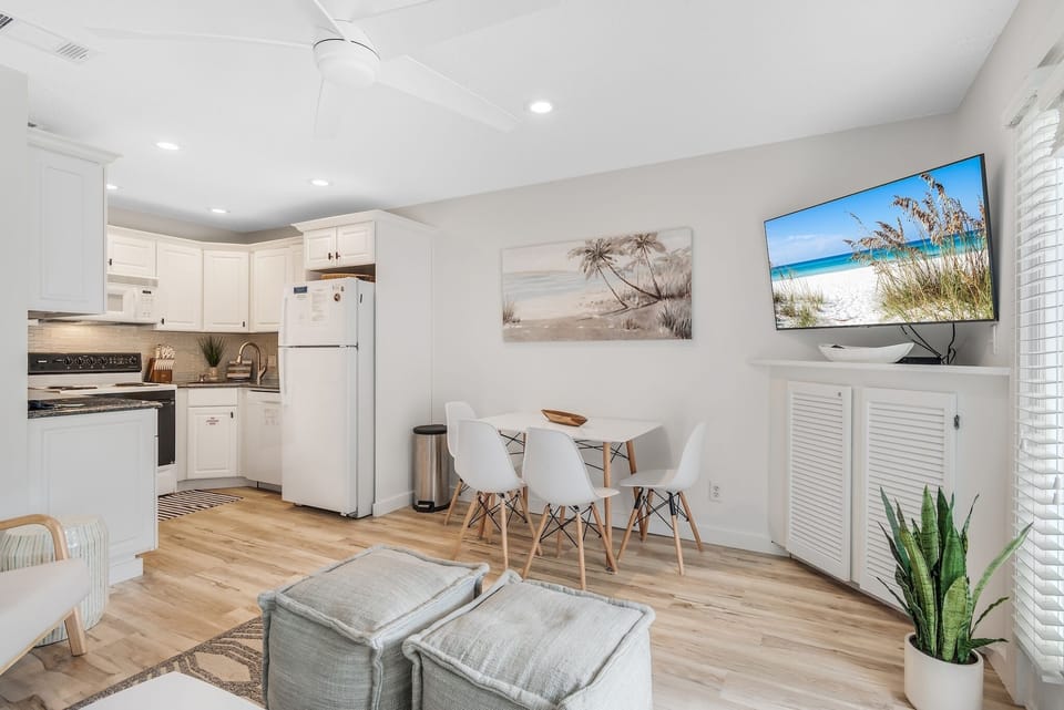 Large Smart TV and open floor plan. Catch up on your favorite series while crafting a home-cooked meal. 