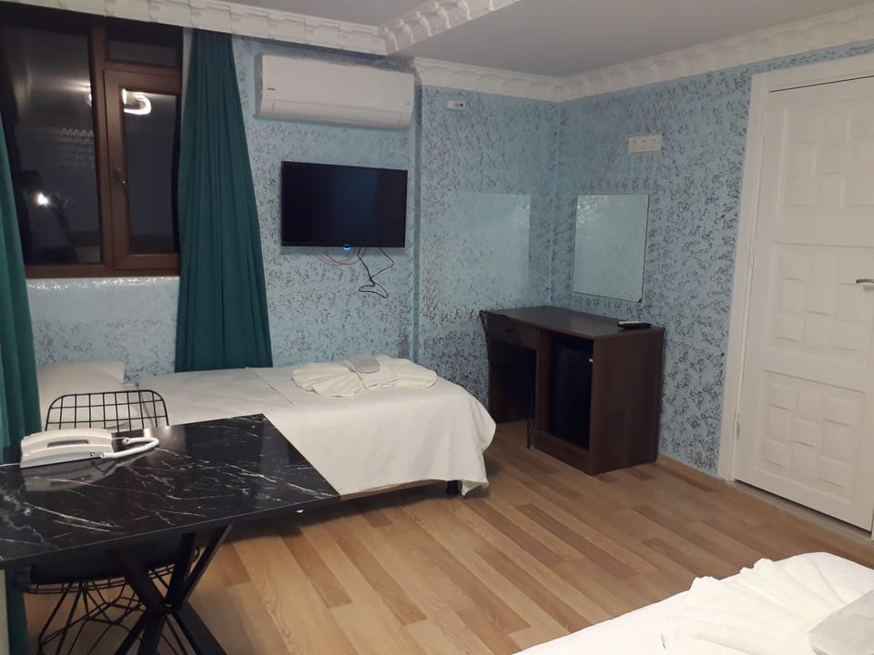 Comfort Room | Desk, laptop workspace, soundproofing, iron/ironing board