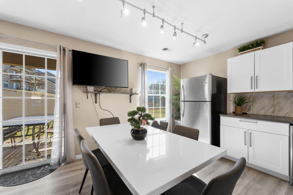 Kitchen table has seating for 6