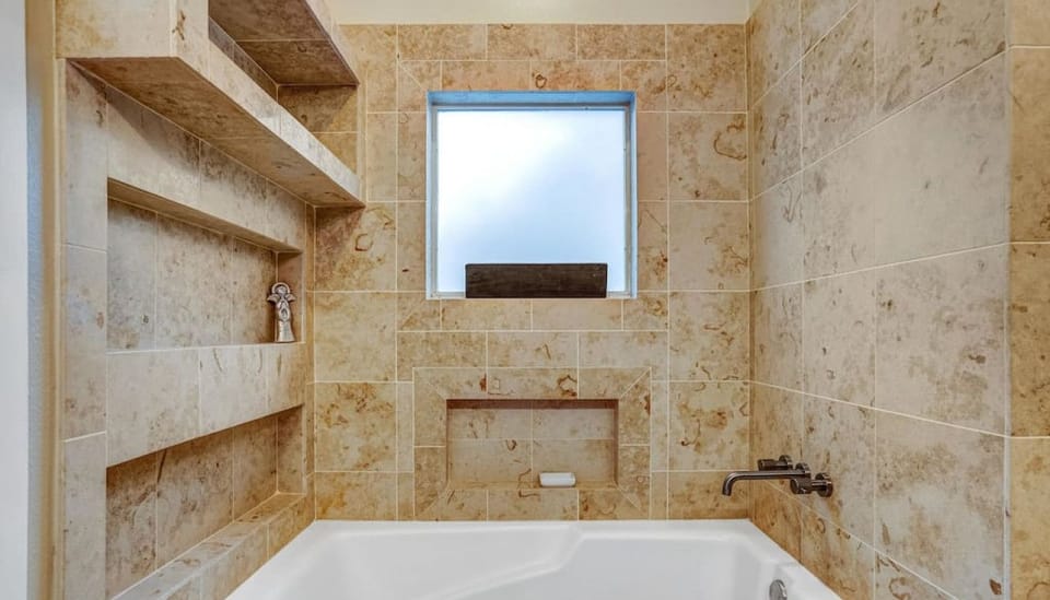 Primary bathroom with the essentials plus shampoo, conditioner, and body wash