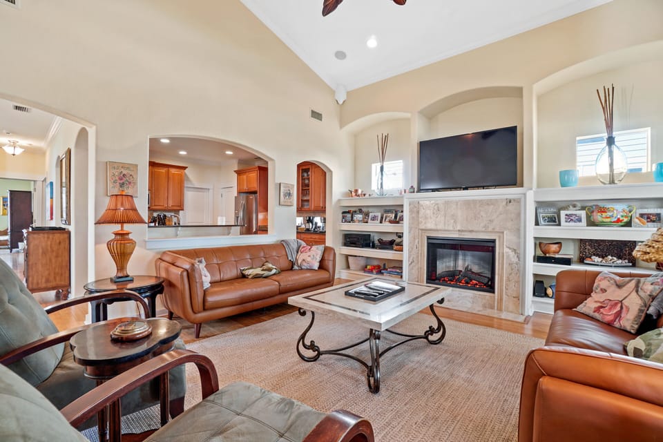 Den stocked with games, TV and 'fireplace". 