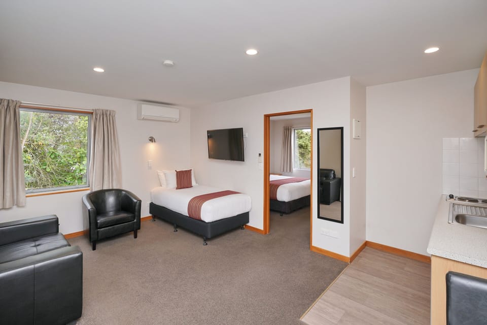Standard Suite, 1 Bedroom, Non Smoking, Kitchen | Living area | 42-inch LCD TV with cable channels, TV