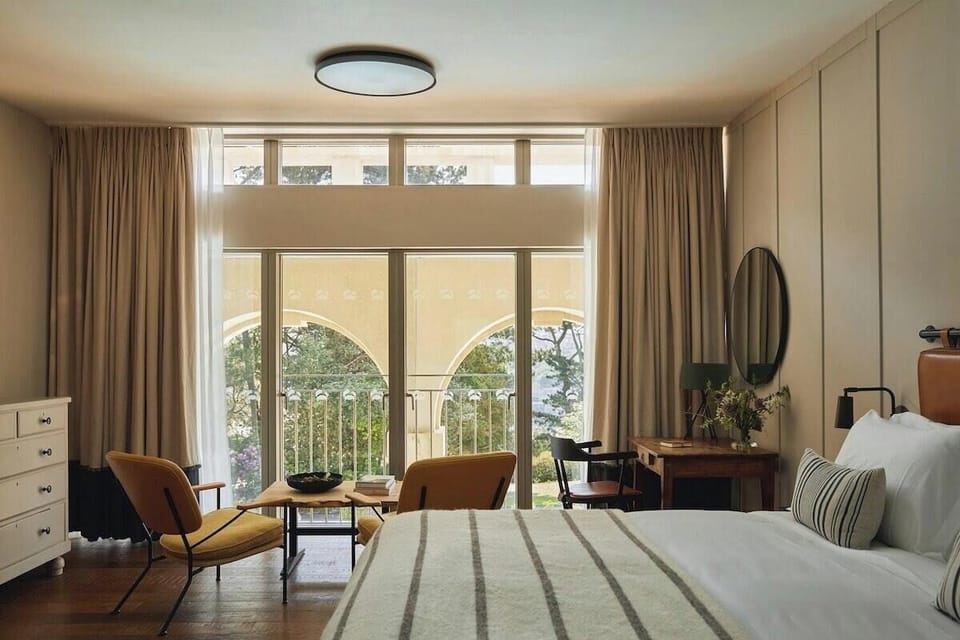Deluxe Partial View Room | Desk, iron/ironing board, free WiFi, bed sheets
