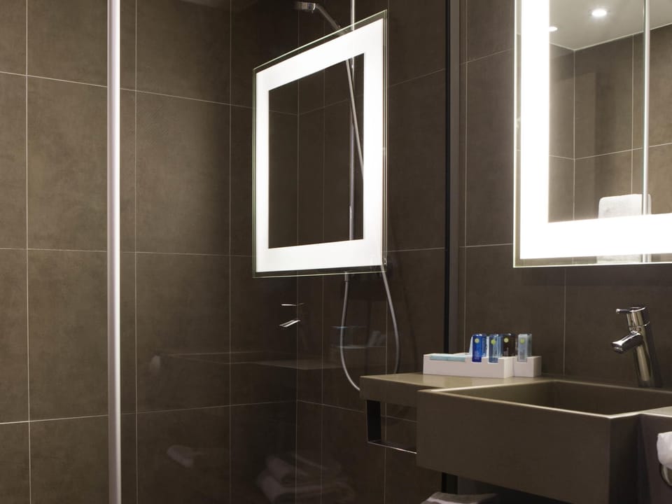 Eco-friendly toiletries, hair dryer, towels