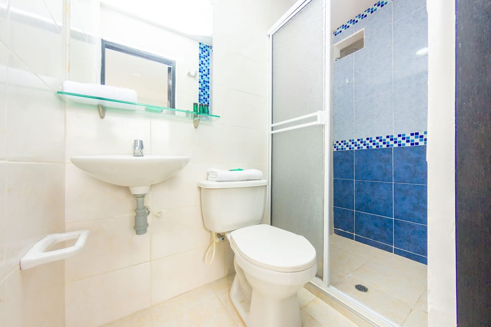 Shower, free toiletries, towels, soap