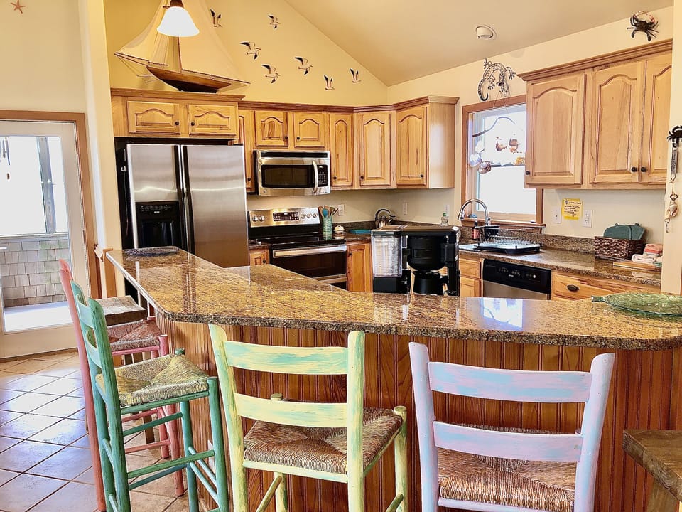 Fully loaded kitchen with just about every appliance and gadget. New cookware