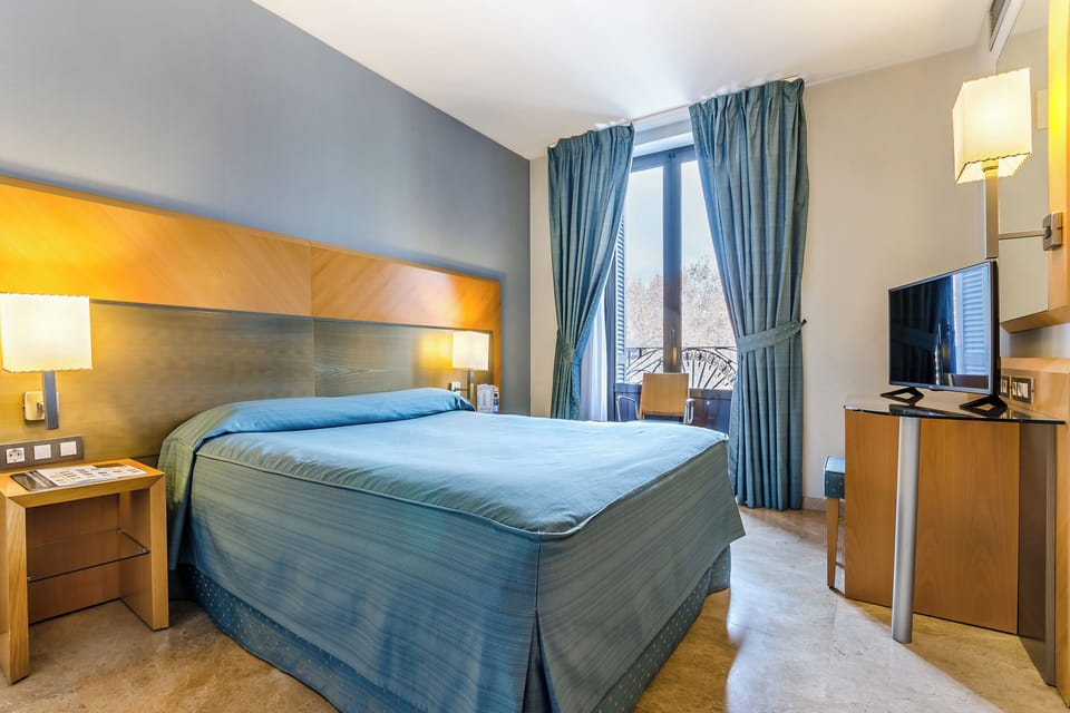 In-room safe, desk, laptop workspace, blackout drapes