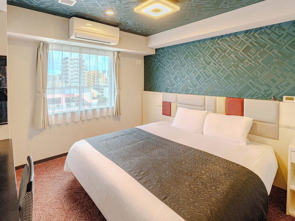 Down comforters, desk, WiFi (free), bed sheets