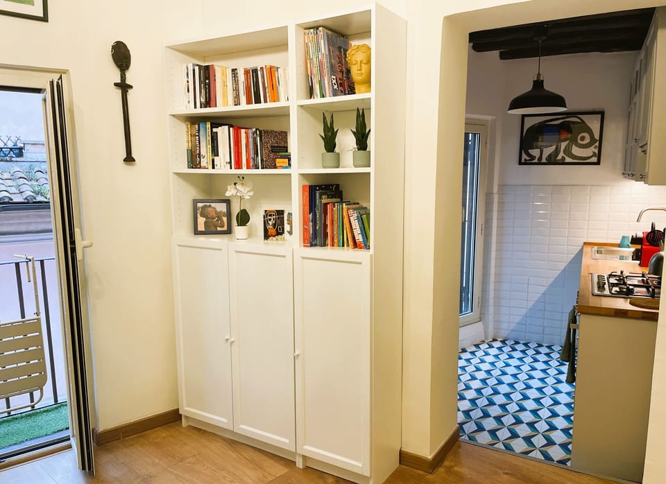 City Apartment | Living area | 21-inch flat-screen TV with cable channels, TV